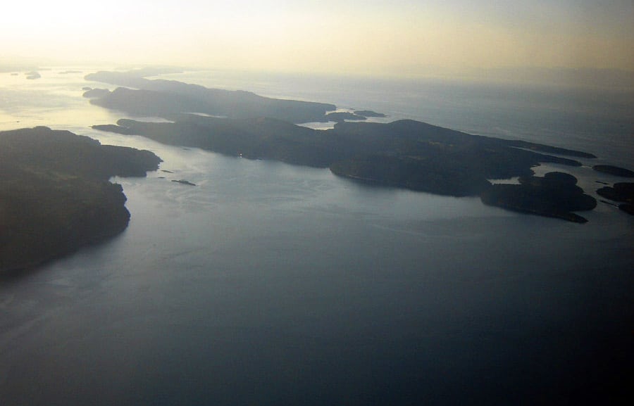 Overhead view of small islands surrounded by water, boating in BC concept. 