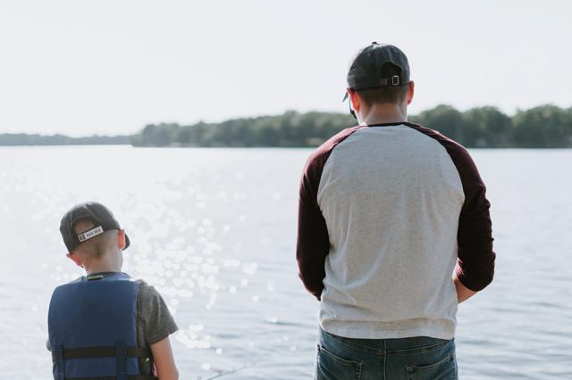 A father and son fishing.