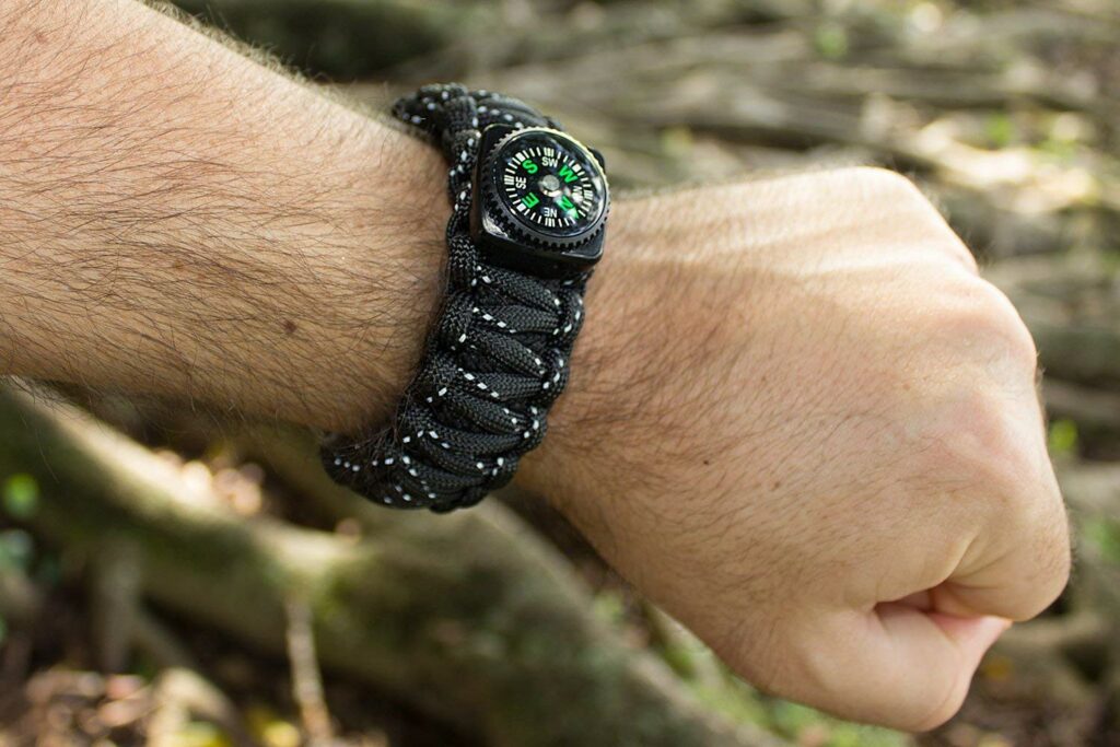 A survival bracelet on someone's wrist, top gifts for the boater concept. 