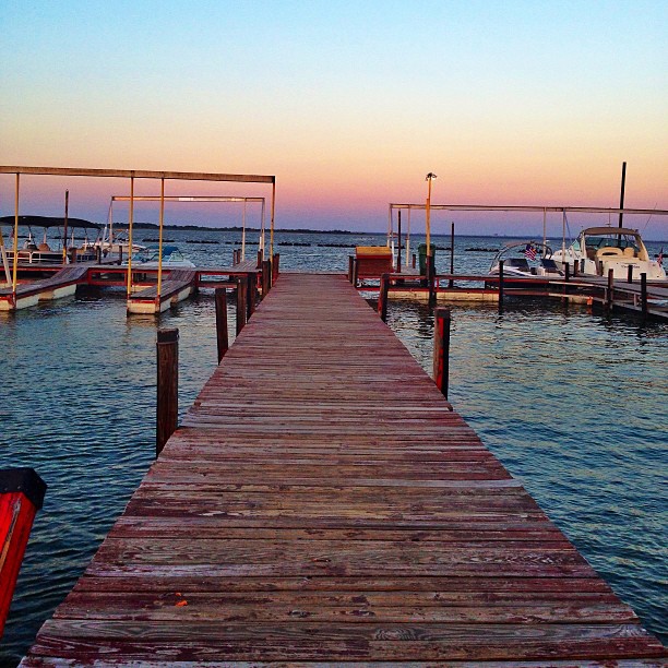 Dock on Lewisville Lake at sunset, where to boat in Texas concept.