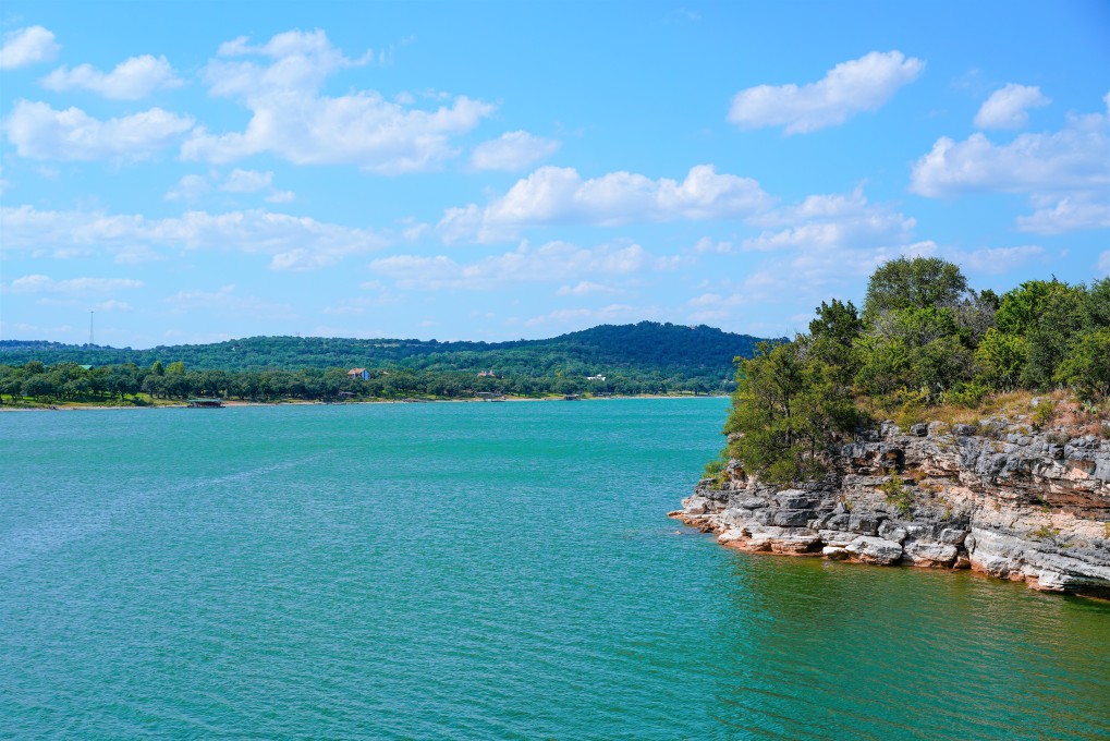 The beautiful blue waters of Lake Travis, boating in Texas concept.
