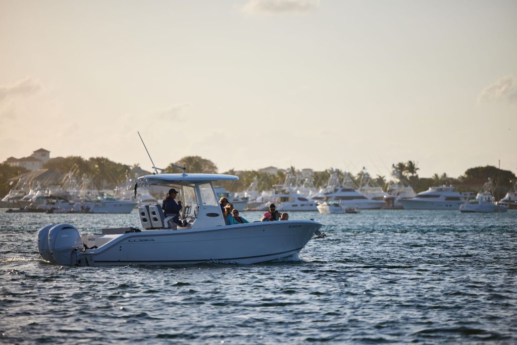 People on a boat on the water, do you need a license to drive a boat in British Columbia concept.