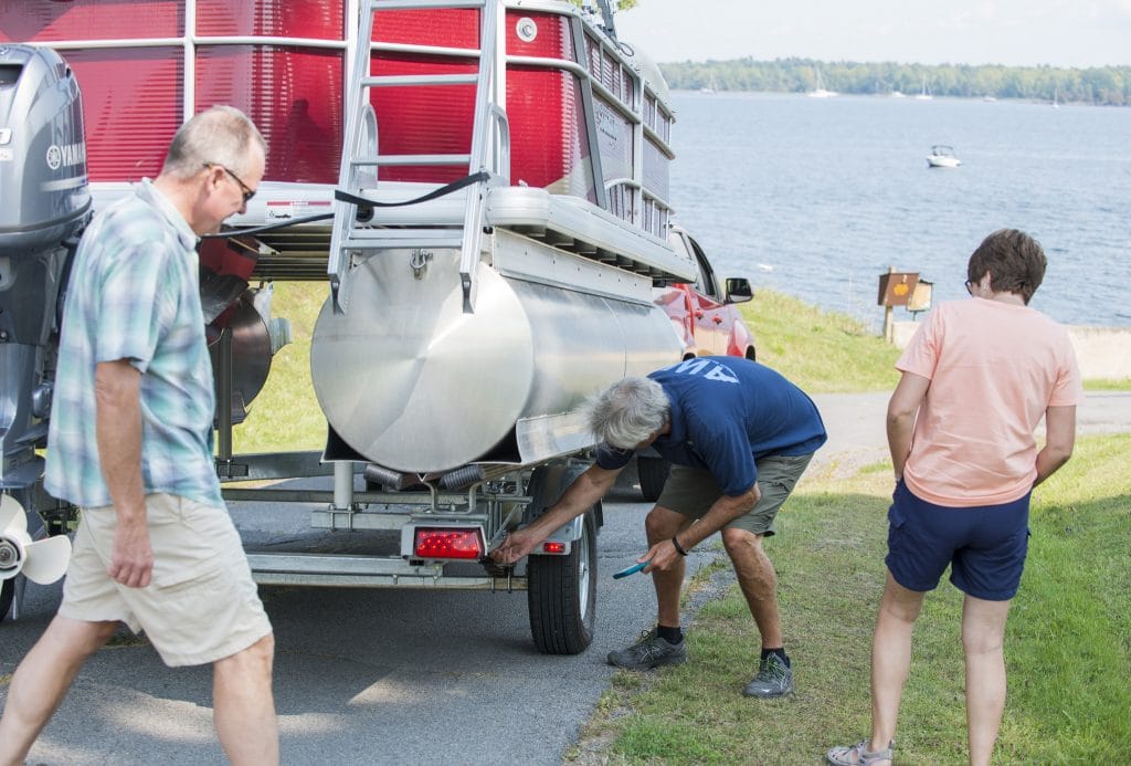 BOATsmart boating license - blog - man inspecting boat