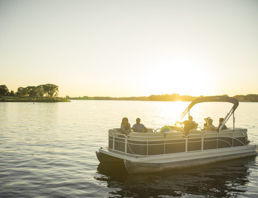 Pontoon boat in the sunset