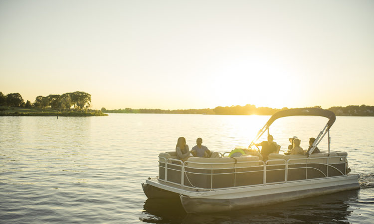 Pontoon boat in the sunset