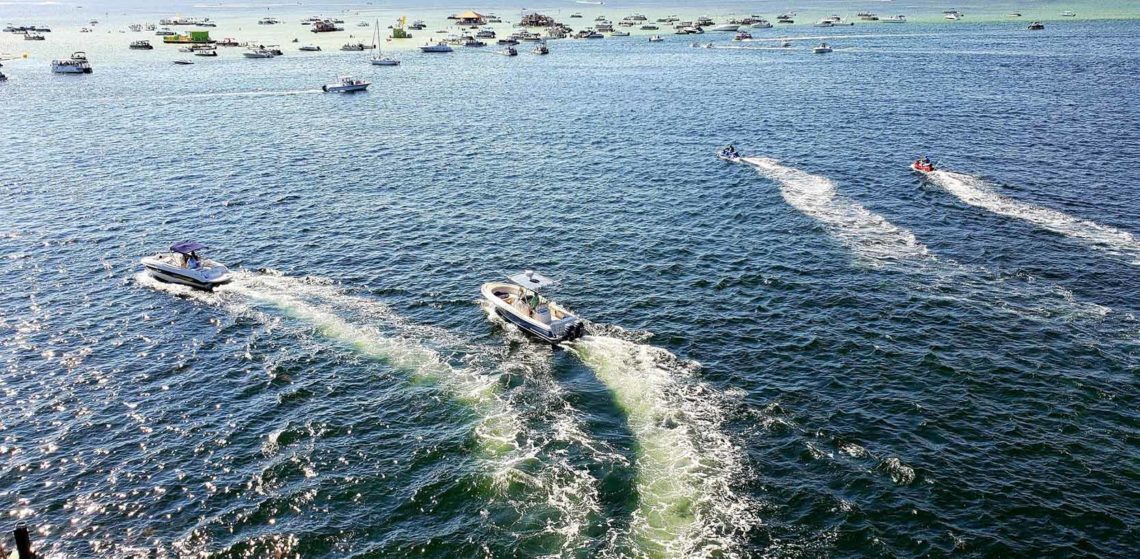 boats anchored at sandbar