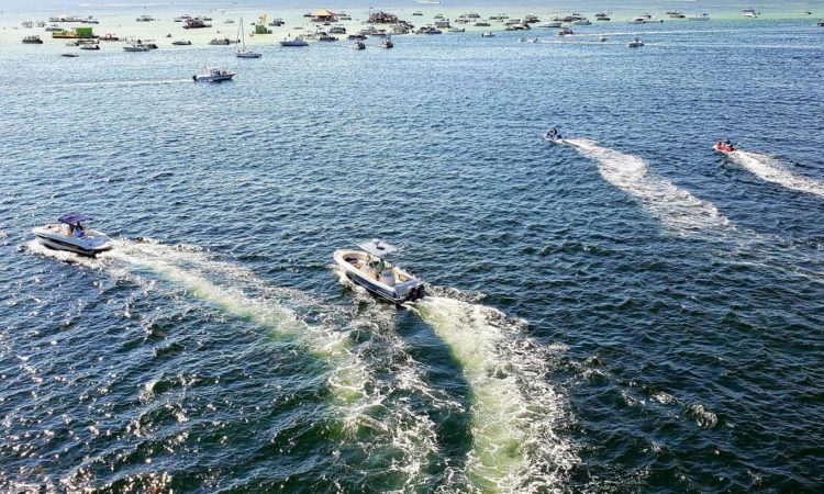 boats anchored at sandbar