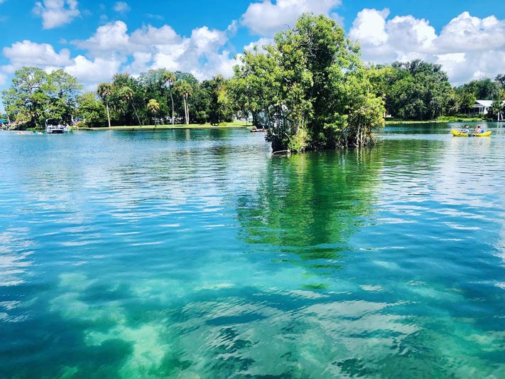 A canoe on the water of the Crystal River.